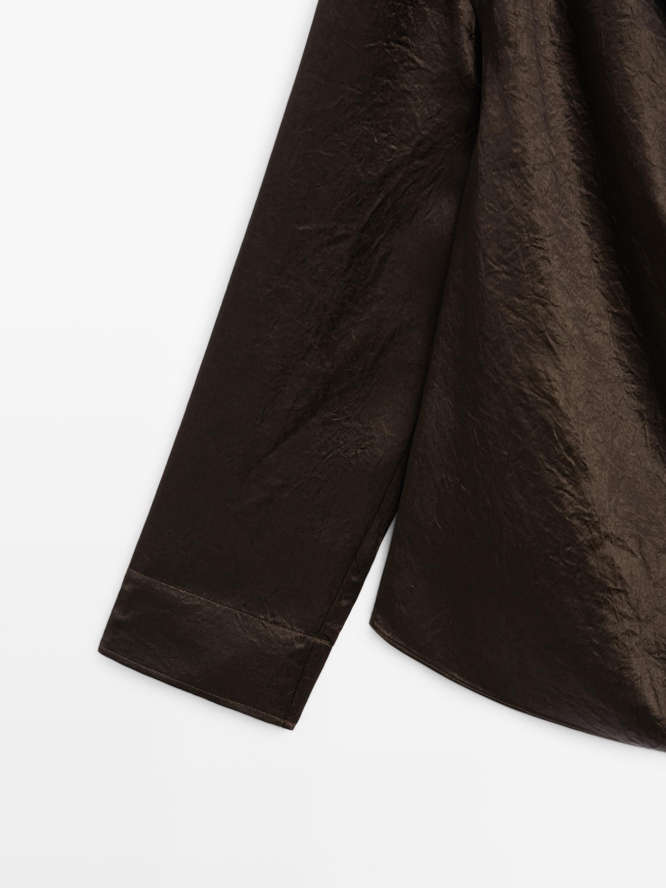 Flowing blouse with draped collar